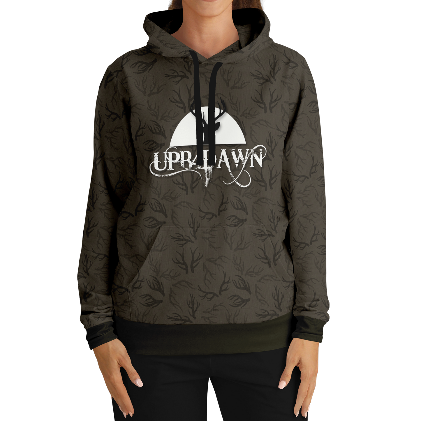 A Bark Brown Deer Hunter - Antler Whisper Pull Over Hoodie made from a tri-blend material, featuring black camouflage patterns and a front pocket. The chest displays a logo with the text "UPR4DAWN" in a white, stylized font. Above the text is a silhouette of a tree and a rising sun, making it perfect adventure apparel for outdoor enthusiasts.