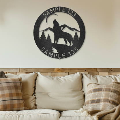 Howling Wolf Monogram customizable laser-cut steel sign on wall above sofa.