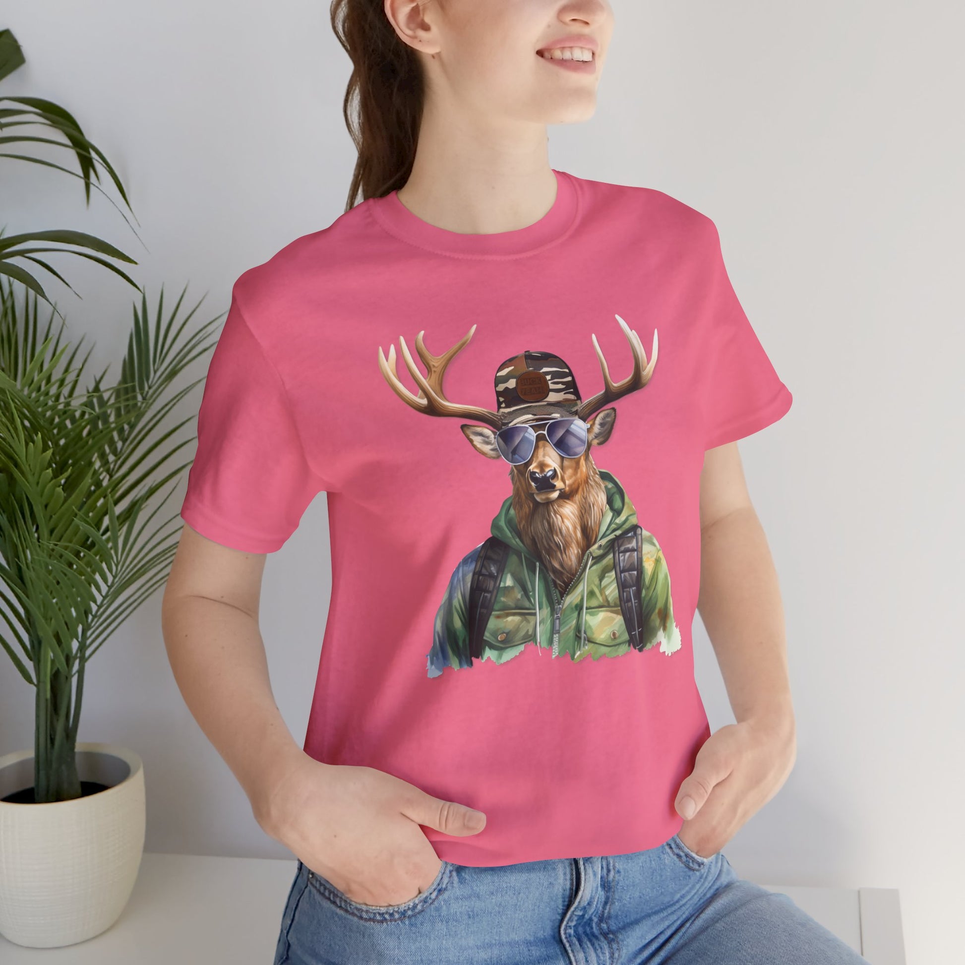 A Chill Hunter Big Buck - T-Shirt with a graphic print of a deer wearing a camouflage jacket and sunglasses, blending human and animal elements in an amusing hunter humor design.