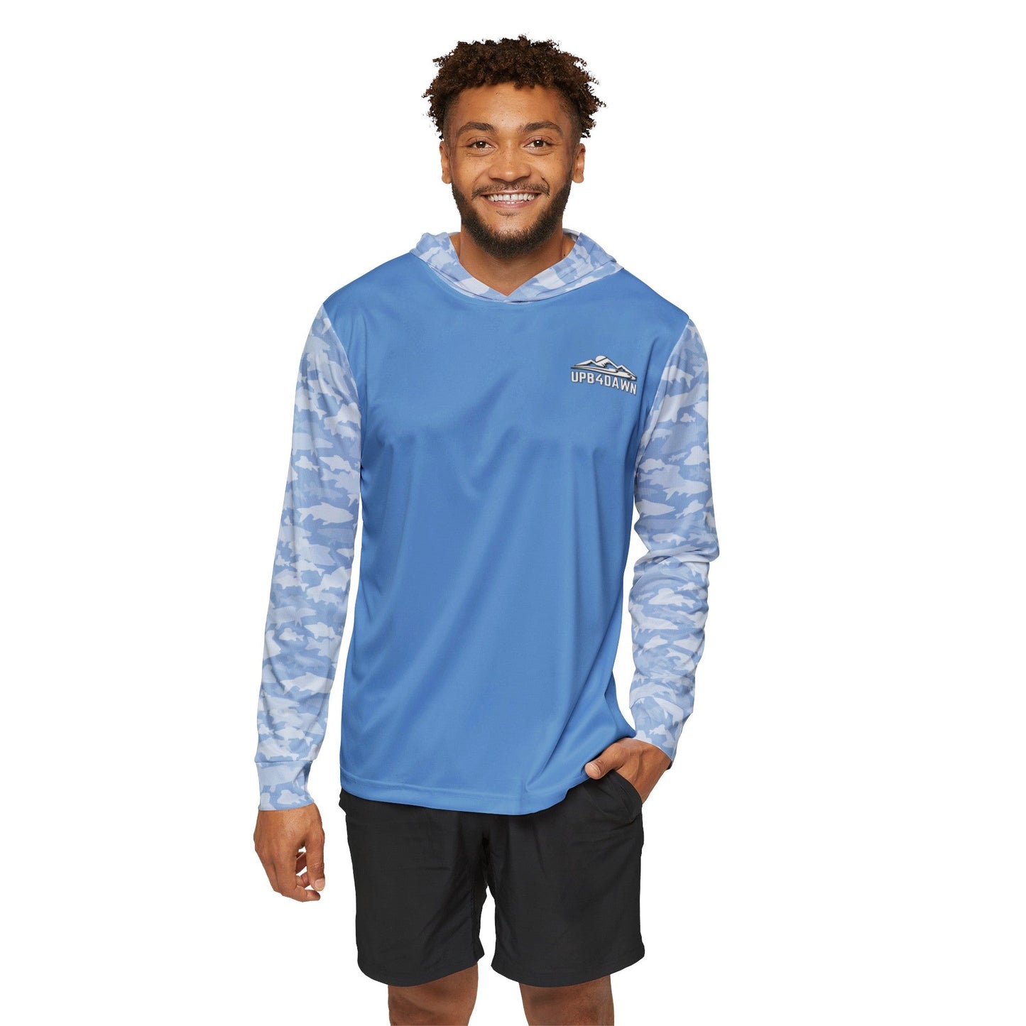 A light blue hooded long-sleeve CastAway Camo Sun Protection Hoodie UPF +50 with white and blue camouflage pattern on the sleeves and hood. The chest area features a small logo with mountains and the text "UP B4 DAWN." Crafted from moisture-wicking polyester, it offers UPF +50 protection, perfect for any outdoor adventure.