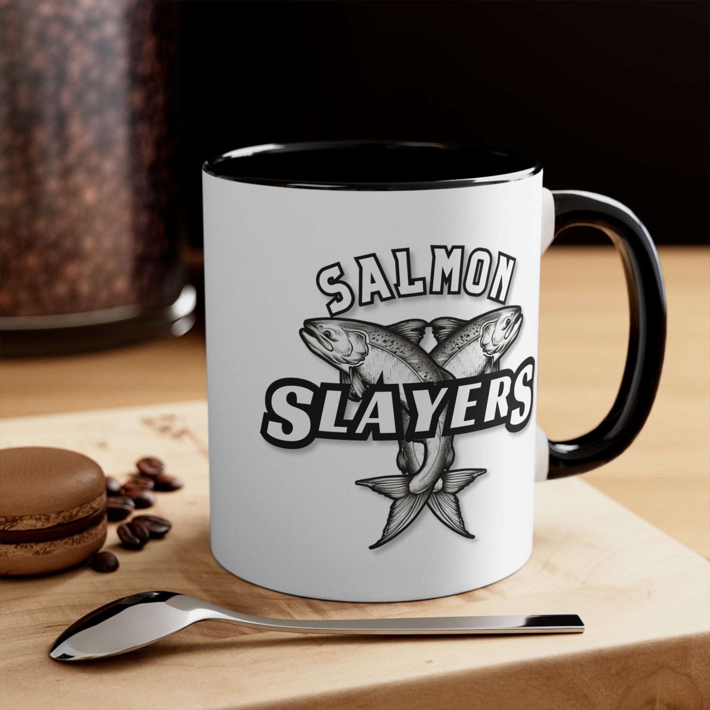 Salmon Slayers - Accent Coffee Mug, 11oz with a colored interior and handle, featuring a black and white illustration of two crossed salmons and the text "salmon slayers" on its side.