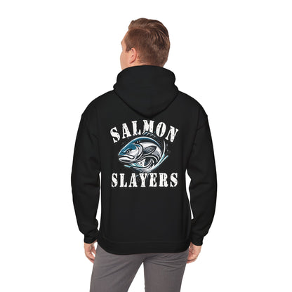 A Salmon Slayers - Fierce Flash - Cotton/Poly Blend Hoodie featuring a graphic of a salmon in mid-swim, with water splashes around it, and the text "Salmon Slayers" printed above and below the fish in bold, white letters with a distressed texture. Crafted from ethically grown US cotton for ultimate comfort.