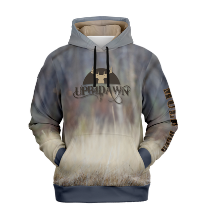 A hoodie with a nature-inspired design, featuring a gradient of earthy tones from top to bottom, transitioning from dark brown and blue to light beige and cream. The center displays an "UPB4DAWN" logo with stylized antlers. The right sleeve has "COMPANY" printed vertically, perfect for any Majestic Mule Deer - Tri-Blend Hoodie enthusiast.