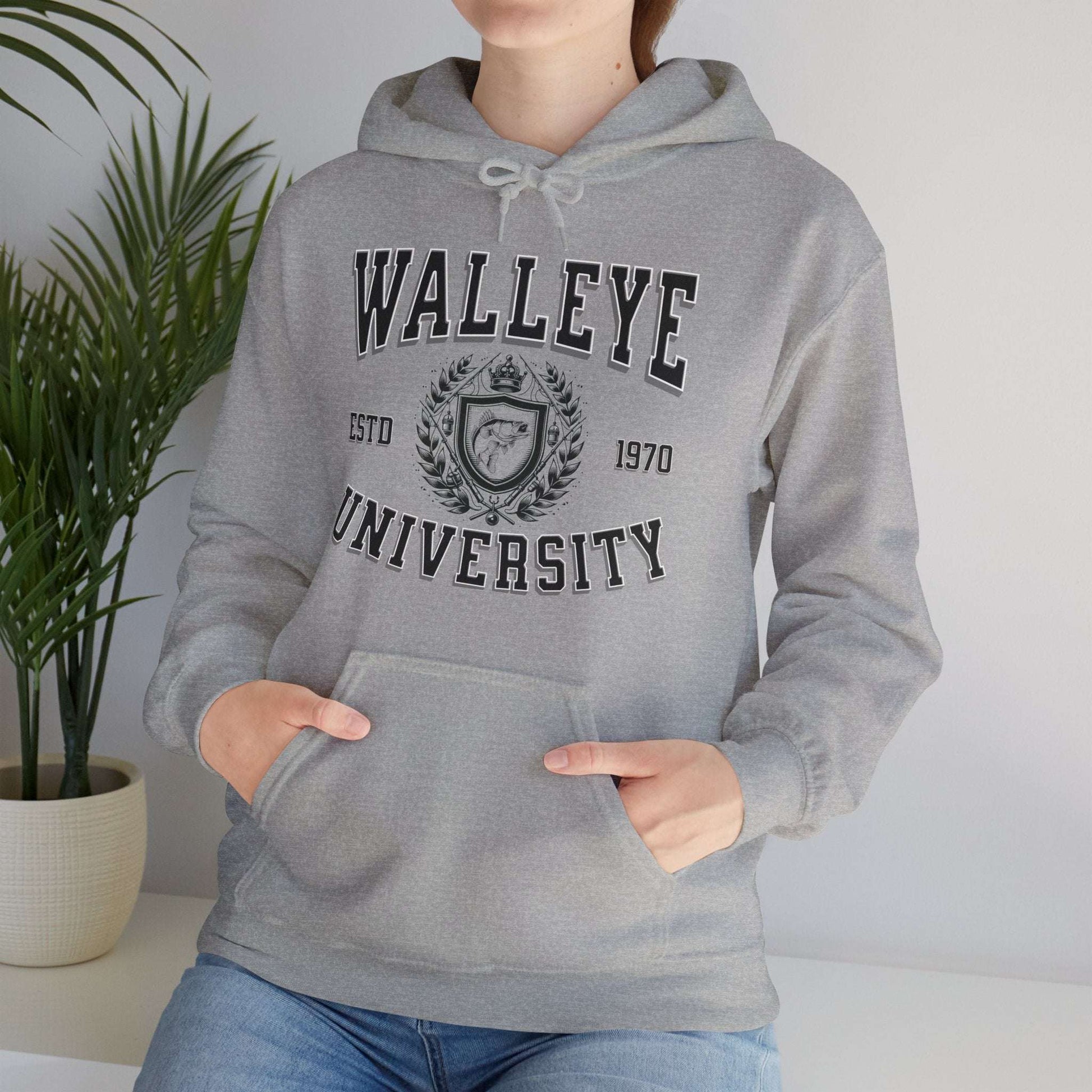 A gray Walleye University - Cotton/Poly Blend Hoodie - 7 Colors with the text "Walleye University" in large black letters and "ESTD 1970" underneath, accompanied by a Walleye University Crest. A red diagonal banner reads "Personalize Year." The hoodie has a front pocket and drawstrings, perfect for showing angler pride.