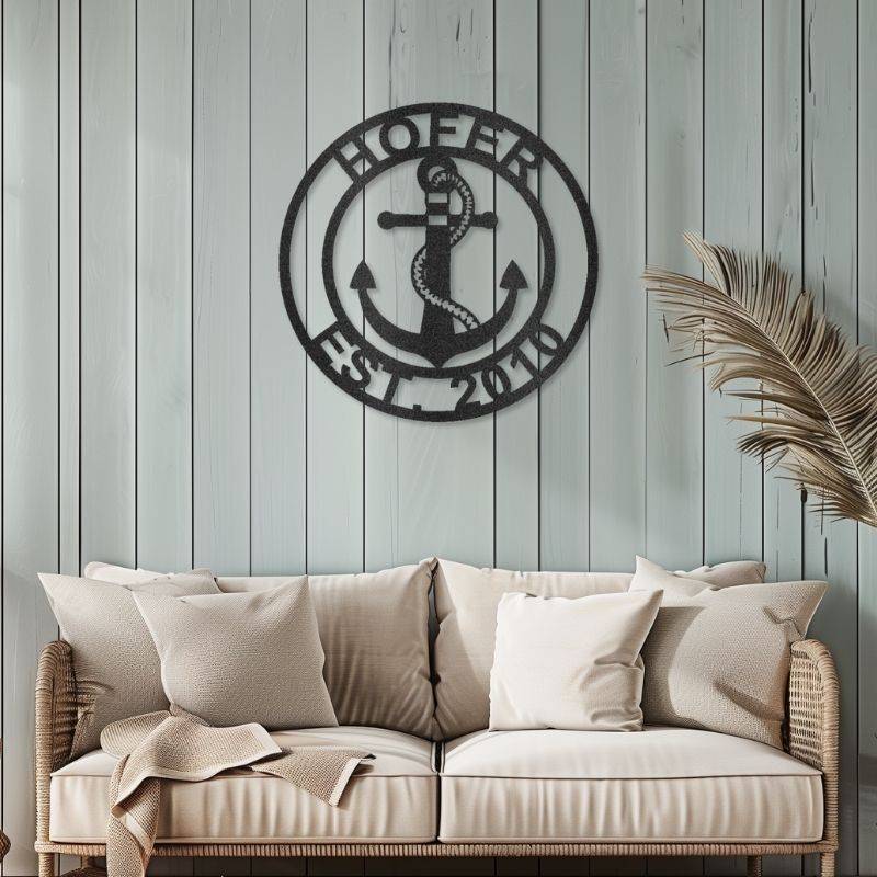 Customizable laser-cut steel anchor family name sign hanging on wall.