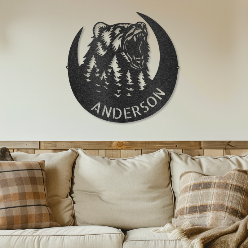 Customizable laser-cut steel sign with roaring bear monogram design mounted on a wall.