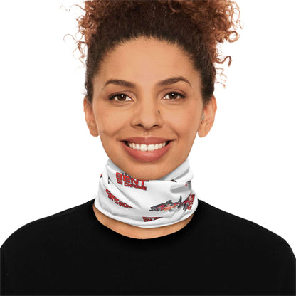 A woman with curly hair wearing a Bent On Chrome lightweight neck gaiter with red salmon logo, over her nose and mouth, looking directly at the camera. This moisture-wicking polyester neck gaiter.