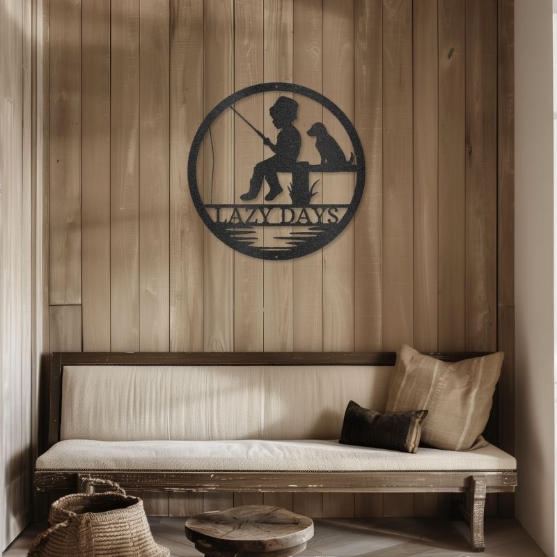 Customizable laser-cut steel sign of a child fishing with a dog, "Lazy Days" monogram.