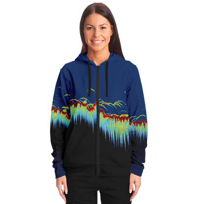 The Sonar Scan Zip-Up Hoodie - Tri-Blend is a unisex hoodie with a vibrant design on the back. The pattern showcases colorful, wave-like shapes in red, yellow, green, and blue set against a gradient background that transitions from dark blue at the top to black at the bottom. The hood features a solid dark blue color.