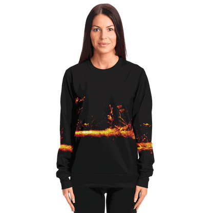 A person is wearing the Sonar Live Sweatshirt, which features a striking fire-themed design in vibrant orange and red across the front, set against a plain white background.