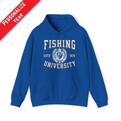 A green **Fishing University - Cotton/Poly Blend Hoodie - 7 Colors** with "Fishing University" printed in white letters on the front. The design includes "ESTD 1970" and a crest with a fish image. A red banner in the top left corner says "PERSONALIZE YEAR." This personalized hoodie features a front pocket and drawstrings.