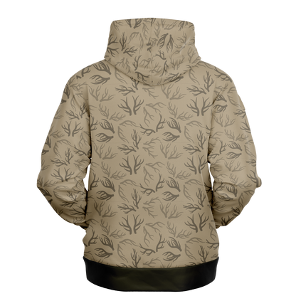 The Deer Hunter - Antler Whisper Pull Over Hoodie in Khaki is a unisex tri-blend hoodie featuring a black tree and branch pattern. The chest area showcases a striking black silhouette of a tree set against a white circle, highlighted by the "UPB4DAWN" logo in stylized white letters. This hoodie comes with convenient front pockets and is finished with black cuffs on the sleeves and waistband.