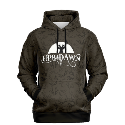 A Bark Brown Deer Hunter - Antler Whisper Pull Over Hoodie made from a tri-blend material, featuring black camouflage patterns and a front pocket. The chest displays a logo with the text "UPR4DAWN" in a white, stylized font. Above the text is a silhouette of a tree and a rising sun, making it perfect adventure apparel for outdoor enthusiasts.