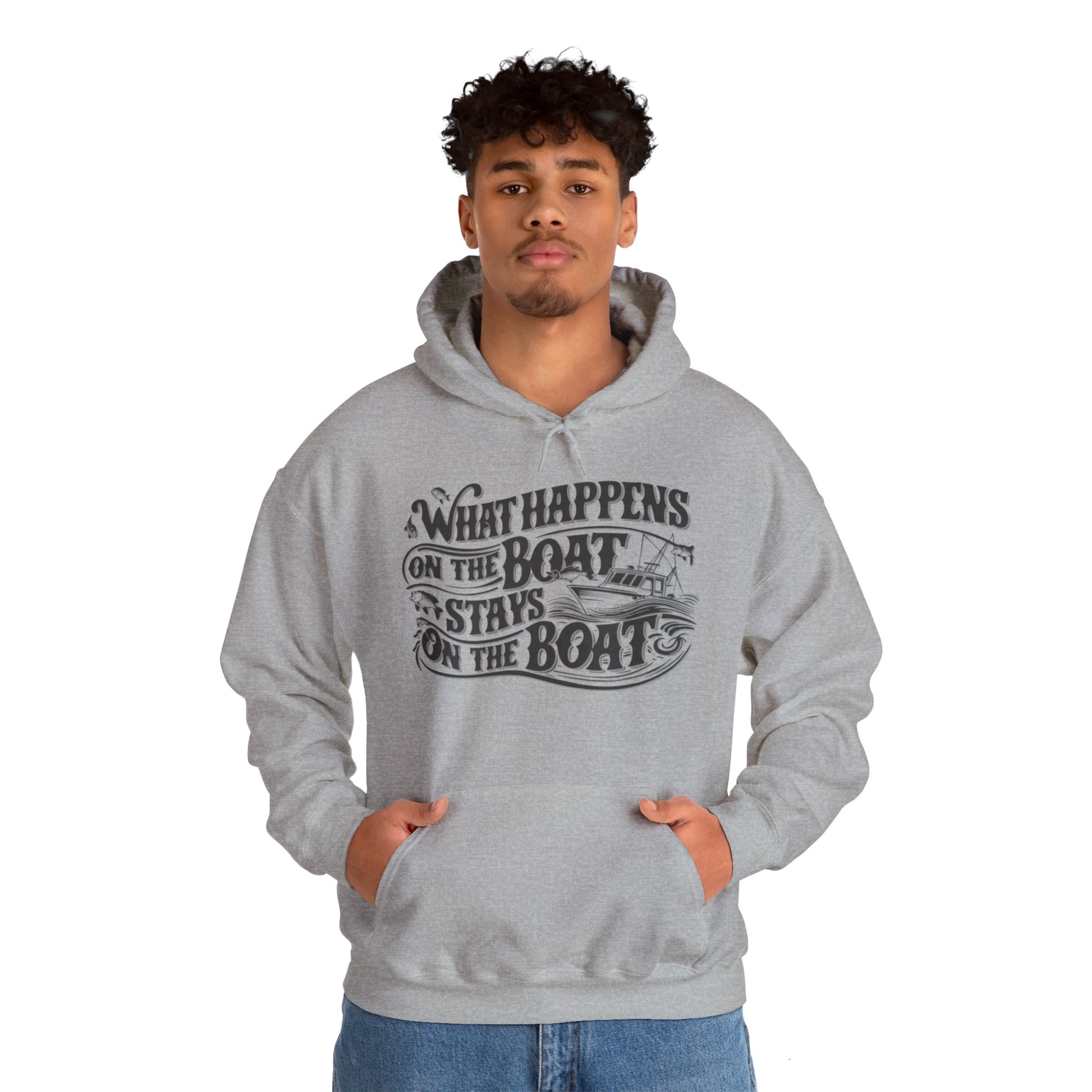 What Happens on the Boat, Stays on the Boat - Cotton/Poly Blend Hoodie - 7 Color Choices featuring white text that says "What Happens on the Boat Stays on the Boat" with fishing hooks and a boat illustration integrated into the design. The unisex hooded sweatshirt has a front pocket and drawstring hood, perfect for those with an adventurous spirit.