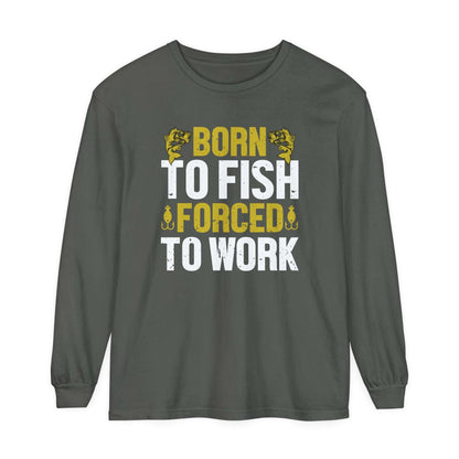 A black long-sleeve Born to Fish, Forced to Work cotton t-shirt with the text "born to fish, forced to work" printed in bold yellow and white letters, flanked by fishing hook graphics.