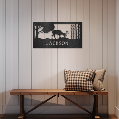 Customizable laser-cut steel sign with grazing deer monogram on a wall.