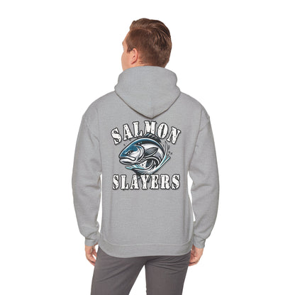 A Salmon Slayers - Fierce Flash - Cotton/Poly Blend Hoodie featuring a graphic of a salmon in mid-swim, with water splashes around it, and the text "Salmon Slayers" printed above and below the fish in bold, white letters with a distressed texture. Crafted from ethically grown US cotton for ultimate comfort.