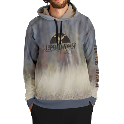 A hoodie with a nature-inspired design, featuring a gradient of earthy tones from top to bottom, transitioning from dark brown and blue to light beige and cream. The center displays an "UPB4DAWN" logo with stylized antlers. The right sleeve has "COMPANY" printed vertically, perfect for any Majestic Mule Deer - Tri-Blend Hoodie enthusiast.