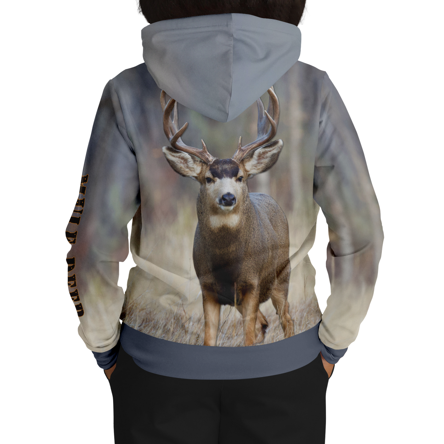 A hoodie with a nature-inspired design, featuring a gradient of earthy tones from top to bottom, transitioning from dark brown and blue to light beige and cream. The center displays an "UPB4DAWN" logo with stylized antlers. The right sleeve has "COMPANY" printed vertically, perfect for any Majestic Mule Deer - Tri-Blend Hoodie enthusiast.