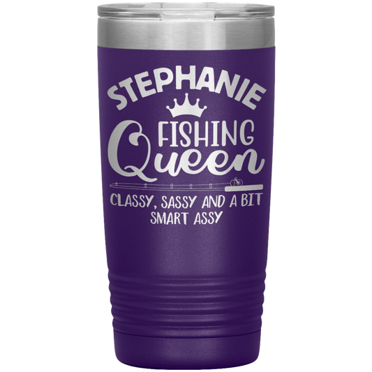 A purple, vacuum-insulated tumbler with a silver lid features the text "Stephanie Fishing Queen - Classy, Sassy and a Bit Smart Assy" in white, with a small fish icon beneath "Queen" and a crown above it. A red banner in the corner says “Personalize It!” making it the perfect Fishing Queen, Classy, Sassy and a bit Smart Assy - Personalized Laser Etched Tumbler - 20 oz.