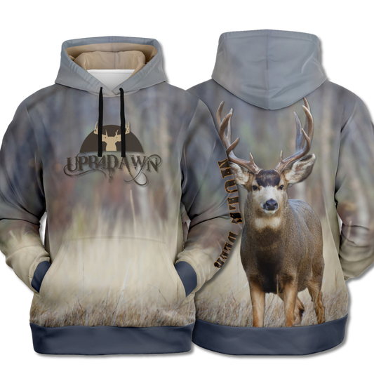 A hoodie with a nature-inspired design, featuring a gradient of earthy tones from top to bottom, transitioning from dark brown and blue to light beige and cream. The center displays an "UPB4DAWN" logo with stylized antlers. The right sleeve has "COMPANY" printed vertically, perfect for any Majestic Mule Deer - Tri-Blend Hoodie enthusiast.