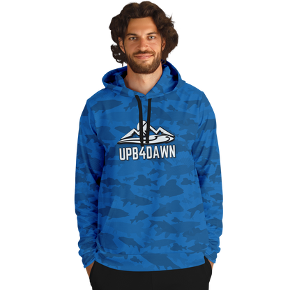 The Angler's Mirage Hoodie - Tri-Blend Hoodie - 6 Colors is a blue camouflage design featuring a graphic of a mountain with the brand name "UPB4DAWN" printed below it. This unisex fit hoodie has a drawstring hood and a front pouch pocket, with its vibrant fish camo pattern standing out against the black background.