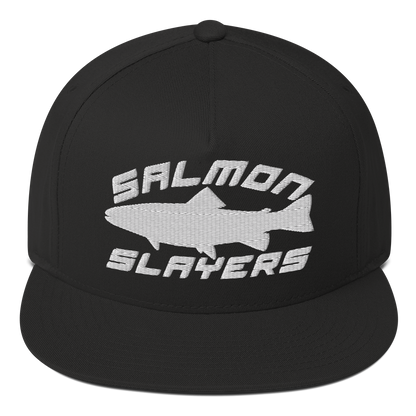 A black ***Salmon Slayers - Sport - Flat Bill Cap*** with a high-profile fit and snapback closure, featuring an embroidered design of a stylized salmon and "SALMON SLAYERS" in bold white letters above and below the fish. The green undervisor adds a unique touch to this stylish cap.