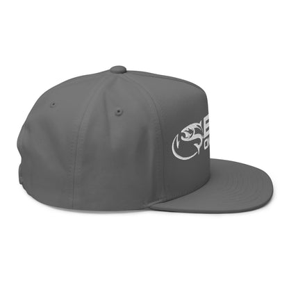 The product, "Bent on Chrome - Flat Bill Cotton Twill Cap - Puffer Embroidery," is a gray baseball cap made from cotton twill material and features a flat brim. Viewed from the side, it displays white embroidery of a stylized creature along with partial text on the side. Designed with a minimalistic and modern aesthetic, this cap includes an adjustable snapback closure for convenience.