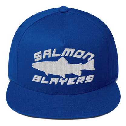 A black ***Salmon Slayers - Sport - Flat Bill Cap*** with a high-profile fit and snapback closure, featuring an embroidered design of a stylized salmon and "SALMON SLAYERS" in bold white letters above and below the fish. The green undervisor adds a unique touch to this stylish cap.