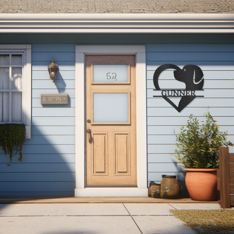 Customizable laser-cut steel sign with dog silhouette in heart shape on blue house wall, showcases "Dog Love Monogram."