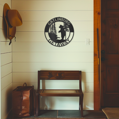 Customizable laser-cut steel sign with a lone bear monogram, featuring a bear against a forest backdrop, adding wild beauty to any space.