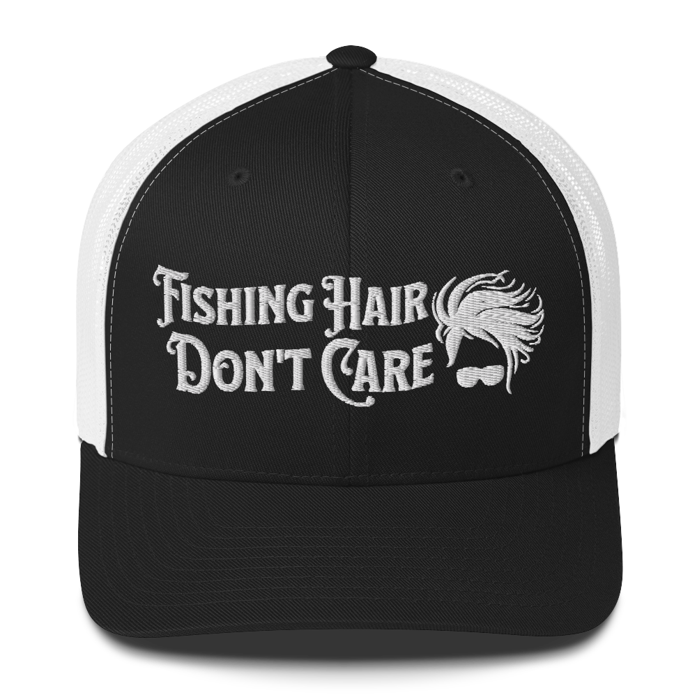 A black and white Fishing Hair, Don't Care - Trucker Style Fishing Cap with a curved brim and mesh back. The front of the cap features the embroidered text "Fishing Hair Don't Care" in white thread next to an image of stylized windblown hair and stylish sunglasses, perfect for fishing enthusiasts.