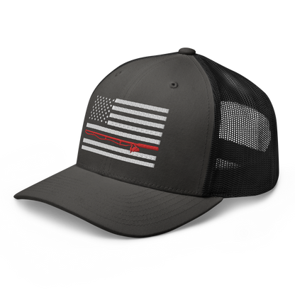 A black Fishing Flag Trucker Cap with an embroidered design of the American flag in white and gray. One of the horizontal stripes is red and features a silhouette of a bass fish. The flag design is centered on the front panel of this fishing enthusiasts hat.