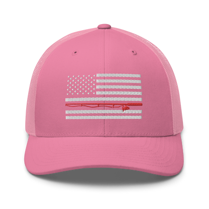 A black Fishing Flag Trucker Cap with an embroidered design of the American flag in white and gray. One of the horizontal stripes is red and features a silhouette of a bass fish. The flag design is centered on the front panel of this fishing enthusiasts hat.