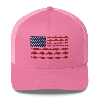 This Fishy Flag Trucker Cap is a black baseball cap featuring an American flag design made up of fish. The blue and white stars section is in the top left, while the red stripes are composed of small fish silhouettes, making it perfect for fishing enthusiasts.