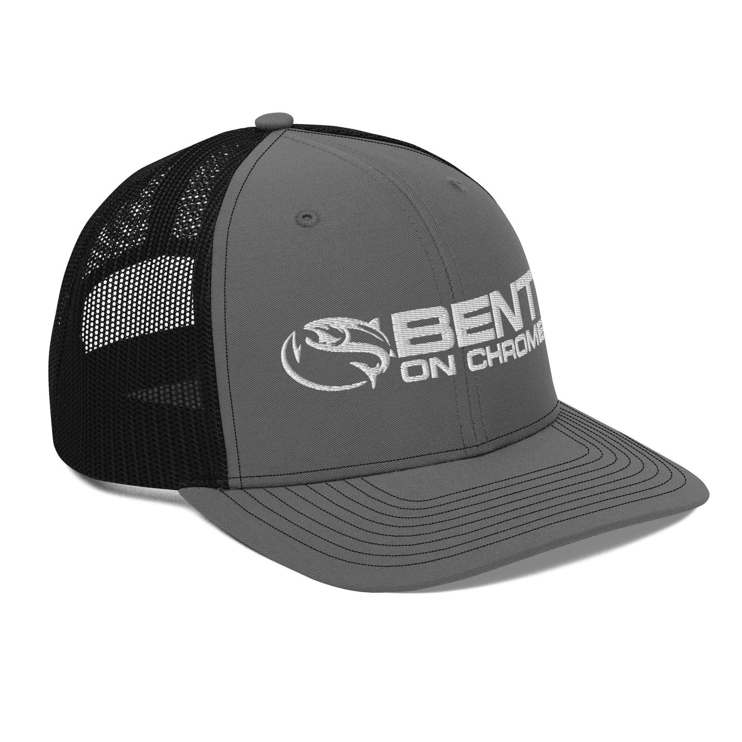 A black and gray Bent on Chrome - Richardson 112 Trucker Cap with Puffer Embroidery featuring the logo "bent on chrome" with a stylized wing design on the front panel. The cap has a mesh back, an adjustable snap